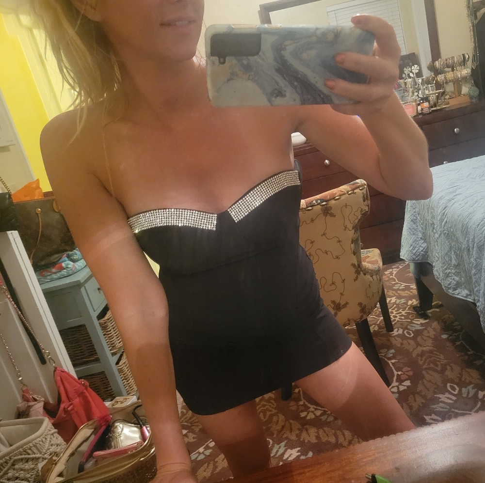 Black dress with sparkles at the top.